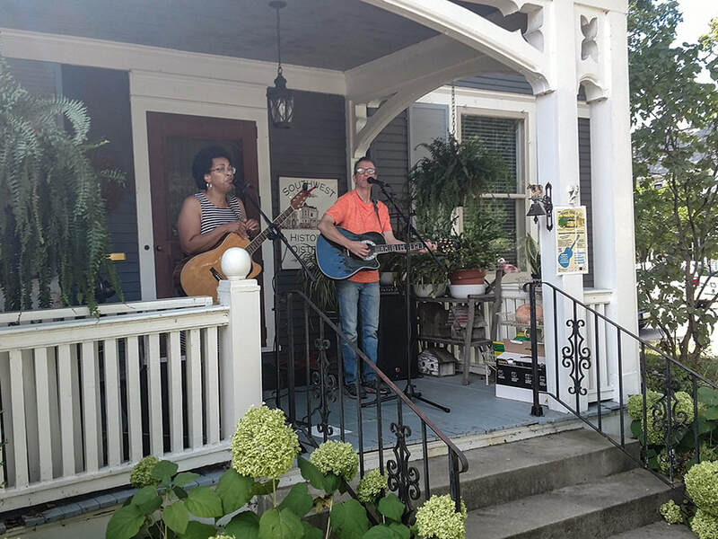 Sweet Betsy performing on a porch in troy ohio